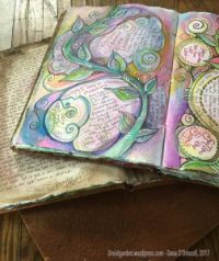 Some more spiritually-themed journals with colorful watercolor pages...